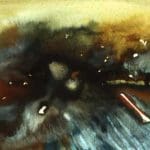 Abstract watercolour painting with dark central splash, streaks of blue and brown, and scattered white highlights on a muted background.