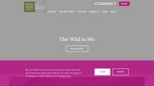 Screenshot of the John Muir Trust website page titled "The Wild in Me," with a button labelled "Watch the film" and options to accept or decline cookies.