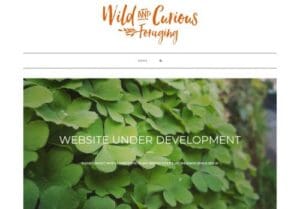 Screenshot of the Wild and Curious Foraging website showing a green leafy background with the text "Website under development.